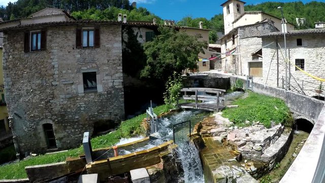 Italy, Umbria, Perugia, Rasiglia, time lapse of medieval village with torrents of water, waterfalls and streams that flow inside the village,