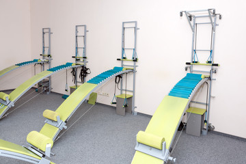 Fototapeta na wymiar Medical spine trainer equipment. Spinal cord injury rehabilitation equipment in modern clinic