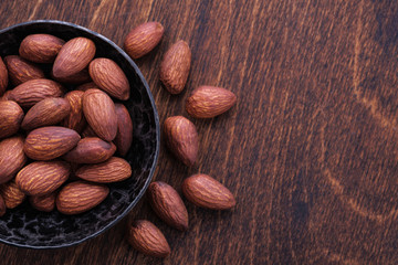 close-up nuts almonds on wooden backgrounds