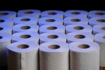 Lack of toilet paper due to the coronavirus panic, the accumulation of many rolls at home as stores close.