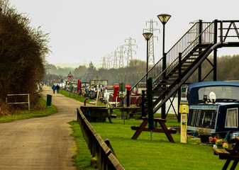 Fototapeta na wymiar Barge storage in England with a walking trail