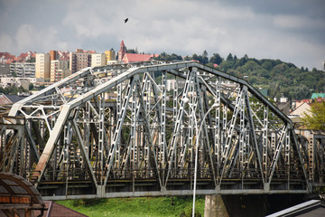 Old historic railway bridge over the San River designed by Gustave Eiffel design office and built in 1891 in Przemyśl, Poland (Most kolejowy im. T. Porembalskiego)