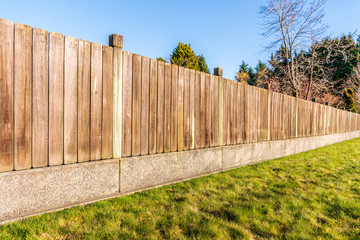 Fototapeta na wymiar Fence built from wood. Outdoor landscape. Security and privacy concept. Vancouver. Canada.