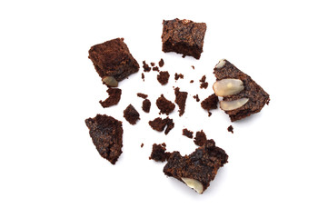 Chocolate brownie with sliced almond nuts toppings crumbs isolated on white background.