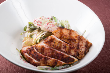 Chicken breast salad served in a bowl