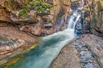Autumn leaves in forest the Basin waterfall