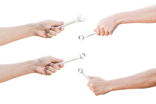 Set of hand holding a spanner isolated on a white background with clipping path.