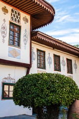 house with balcony and flowers