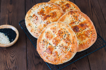 Ramadan pidesi Traditional turkish flatbread with nigella or sesame seeds. Usually baked during Holy Ramadan month. - 335040548