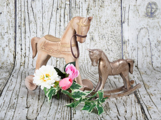 woden horses with flowers