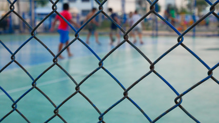 Fototapeta premium chain link fence with barbed wire