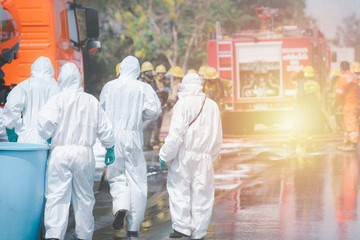 Coronavirus covid 19  experts wear protective clothing for viral diseases and