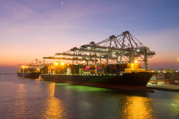 Container , container ship in export and import business and logistics. Shipping cargo to harbor by...