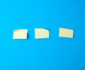 yellow paper stickers on a blue background