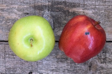 red apples on wooden table