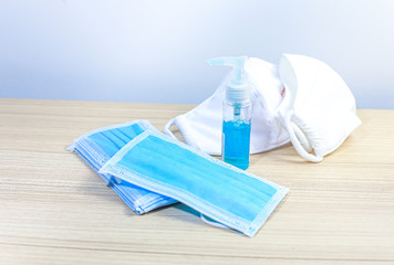 Coronavirus prevention medical surgical masks and hand sanitizer gel for hand hygiene corona virus protection.