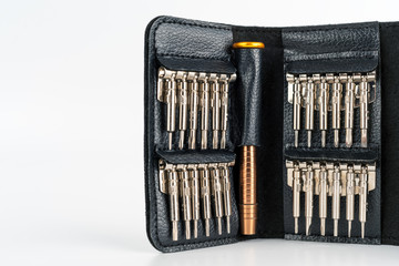 Unbranded mini torx and screwdriver kit photographed in studio and isolated on white background. Product photography, tools and reparation concept.
