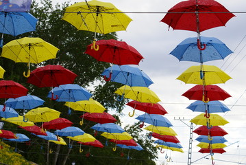 Fototapeta na wymiar umbrella on a background of blue sky