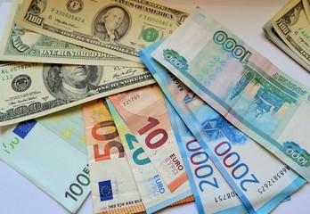 Fototapeta na wymiar Euro banknotes, dollars and rubles.