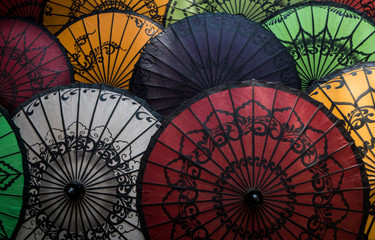 Handmade colorful umbrellas on street market in Bagan, Myanmar (Burma).