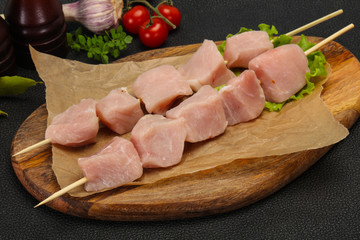 Raw pork meat skewer for grill