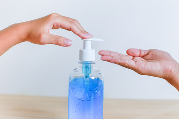 Washing your hand by alcohol sanitizer gel for protecting infection from a Covid-19 virus and other viruses.