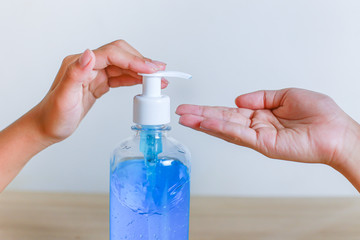 Washing your hand by alcohol sanitizer gel for protecting infection from a Covid-19 virus and other viruses.