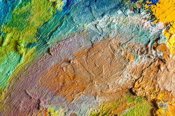 Background image of bright oil-paint palette closeup