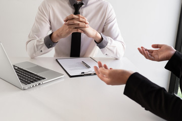 Job seeker listening interview employee talk about job description for job interview in the office