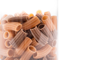 Glass jars of uncooked noodle or macaroni