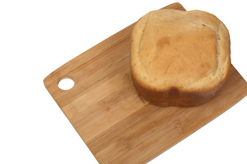 hot bread on a wooden Board on a white background