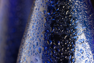 Water drops on metal surface. Abstract background