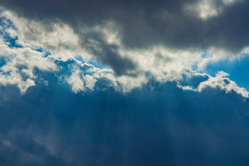 Naklejka na ściany i meble heaven photography dramatic cloudy sky landscape sun rays light