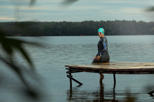 one caucasian woman practicing triathlon swimming	 - Powered by Adobe