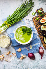 Vegan daily meal lunch or vegetarian dinner. Healthy food diet. Top above, flat lay view. Vegetables based. Eggplants, aubergine, peas soup, sesame seeds, onion sprouts.