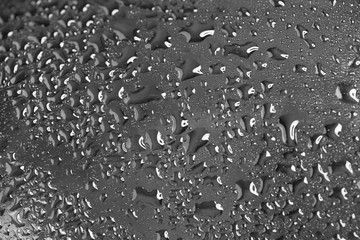 Water drops on metal surface. Abstract background