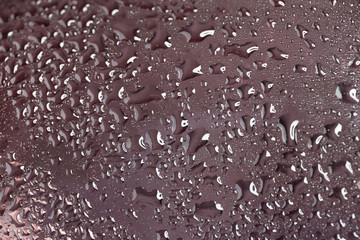 Water drops on metal surface. Abstract background