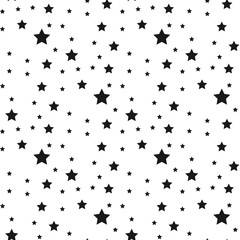 Obraz premium Seamless pattern with black stars on a white background. Vector illustration.
