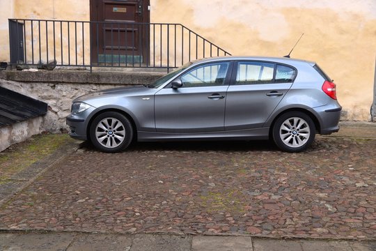 LINKOPING, SWEDEN - AUGUST 25, 2018: Silver BMW 1 Compact Car Parked In Linkoping, Sweden. There Are 4.8 Million Passenger Cars Registered In Sweden.