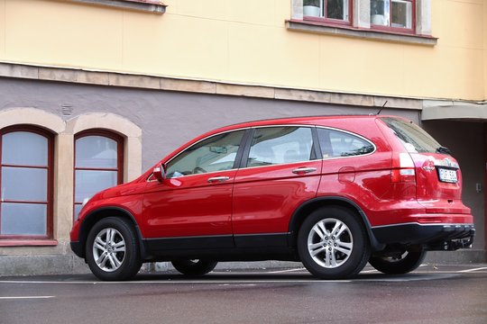 LINKOPING, SWEDEN - AUGUST 25, 2018: Red Honda CR-V SUV parked in Linkoping, Sweden. There are 4.8 million passenger cars registered in Sweden.