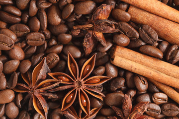 texture spilling coffee beans cinnamon and cloves