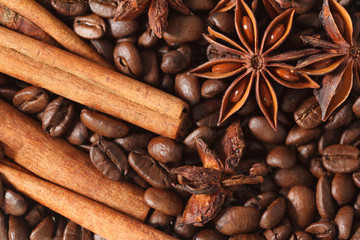 texture spilling coffee beans cinnamon and cloves