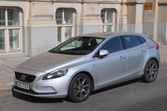 STOCKHOLM, SWEDEN - AUGUST 24, 2018: Silver Volvo V40 compact car parked in Stockholm, Sweden. There are 4.8 million passenger cars registered in Sweden.