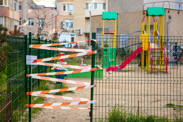 Fototapeta na wymiar Ukraine. Odessa April 2, 2020. playground. COVID-19 security measures and security in the yard