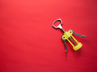 Metal corkscrew on colored background. Top view