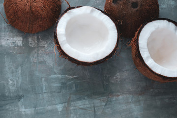 top view layout of fresh coconuts on a gray concrete  background