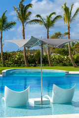 sun loungers by the pool