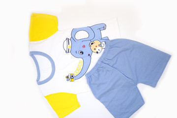 children's clothing shorts, suits, t-shirts, for boys on a white background, top view, place for text.