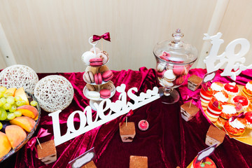Delicious wedding reception. cupcakes and macaroons