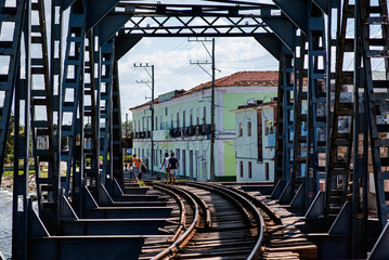 An old railway bridge, the tracks, Caribbean atmosphere.